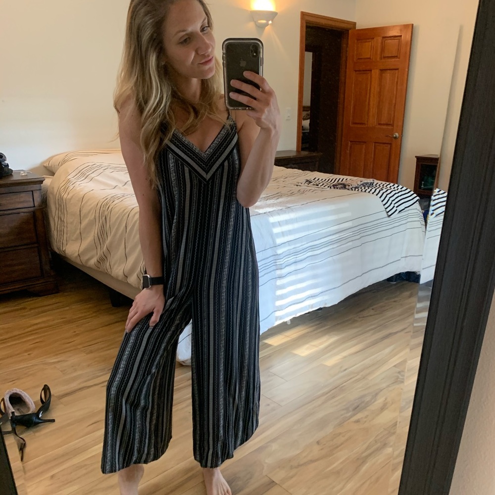 Wide leg romper with slit in legs